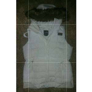 White Northface vest size large.